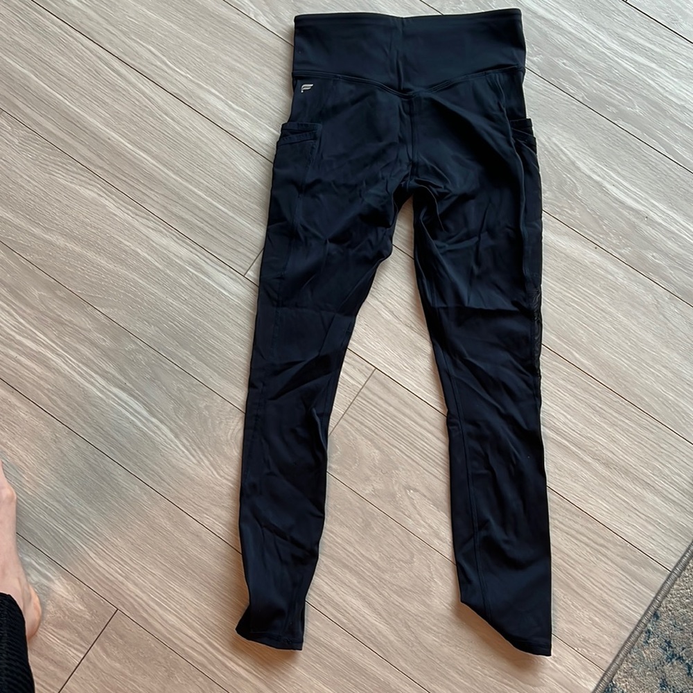 Fabletics xs navy blue leggings. Sheer side with side pockets